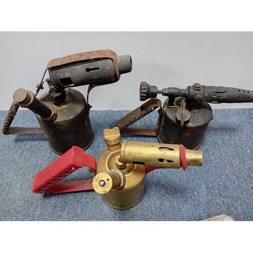 75 - A collection of tools. Featuring, blowtorch's, a Clarke gritblast gun, Evershed & Vignoles Megger in... 