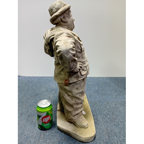 84 - A stone cast garden statue of the famous comedy duo Laurel and Hardy. Height 21.5
