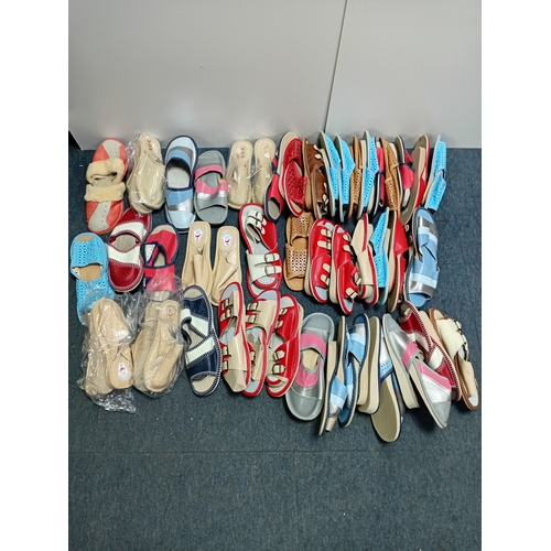 88 - A large lot of women's slippers, sandals and flip flops