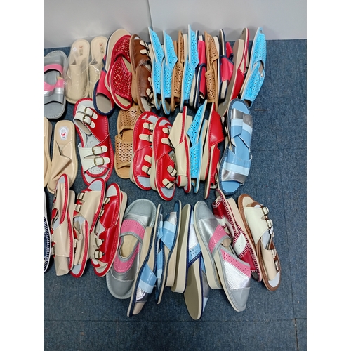 88 - A large lot of women's slippers, sandals and flip flops
