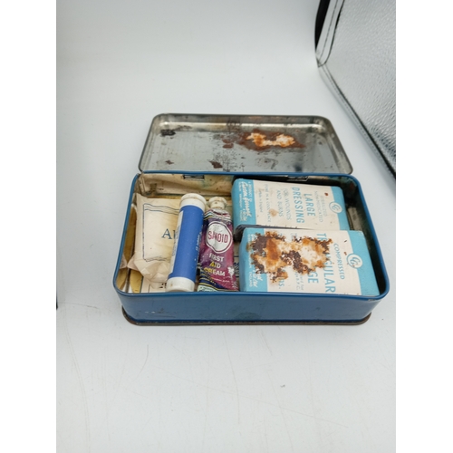 89 - A vintage security box full of keys & a vintage motorists first aid tin with contents.