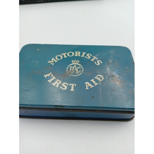 89 - A vintage security box full of keys & a vintage motorists first aid tin with contents.
