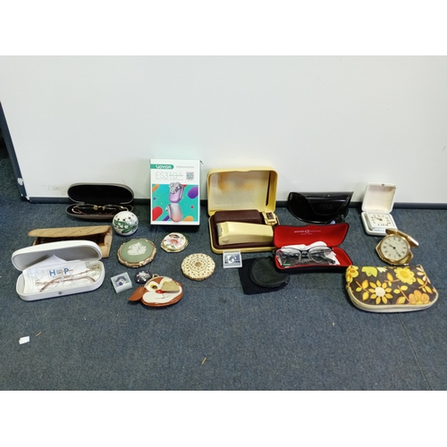 91 - A collection of Glasses & powder compacts. To include Stratton powder compacts, hair trimmers etc...