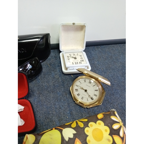 91 - A collection of Glasses & powder compacts. To include Stratton powder compacts, hair trimmers etc...