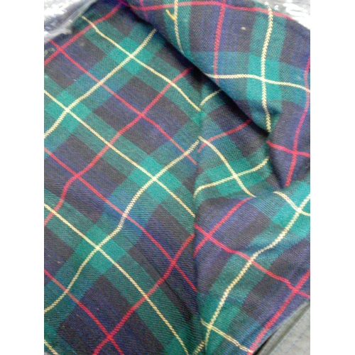 92 - A collection of 20  Barbour style waxed dog jackets. In various sizes.