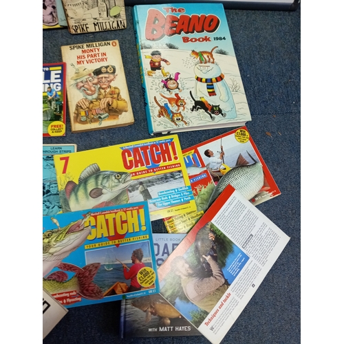 94 - A collection of vintage books. To include fishing guides, The Beano