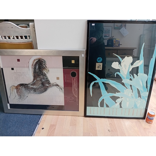 115 - A pair of framed prints featuring Kevin Lee New man height 36