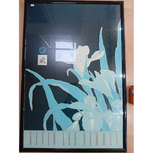 115 - A pair of framed prints featuring Kevin Lee New man height 36