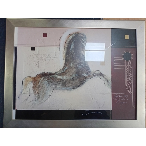 115 - A pair of framed prints featuring Kevin Lee New man height 36