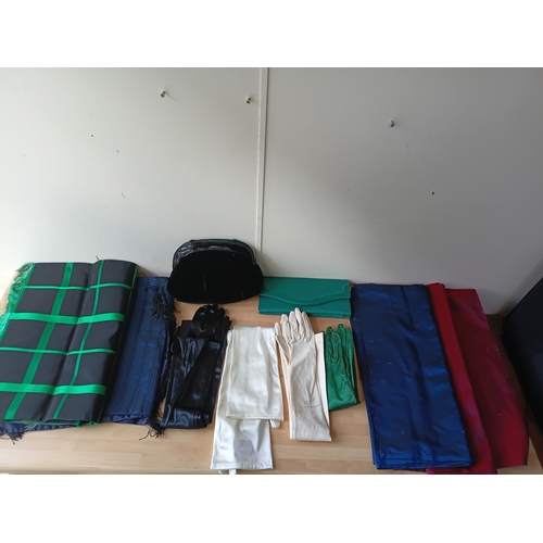 97 - A job lot of vintage women's accessories, to include; silk gloves, a purse, a bag, and table runners... 
