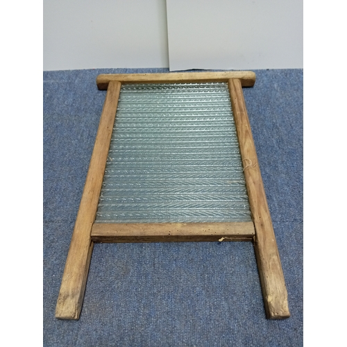 99 - A antique glass & wooden wash board. (Height 50 cm x Width 36 cm)
