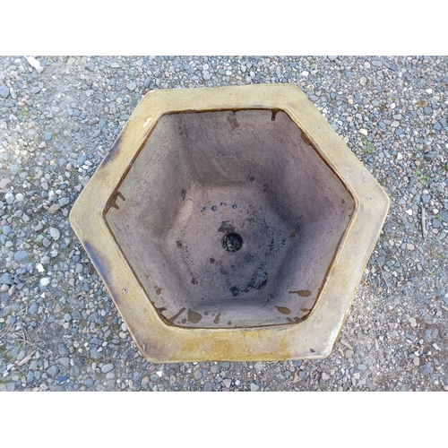 120 - A large japanese glazed ceramic hexagonal pot depicting birds. (Height 32 cm X Diameter 54 cm)