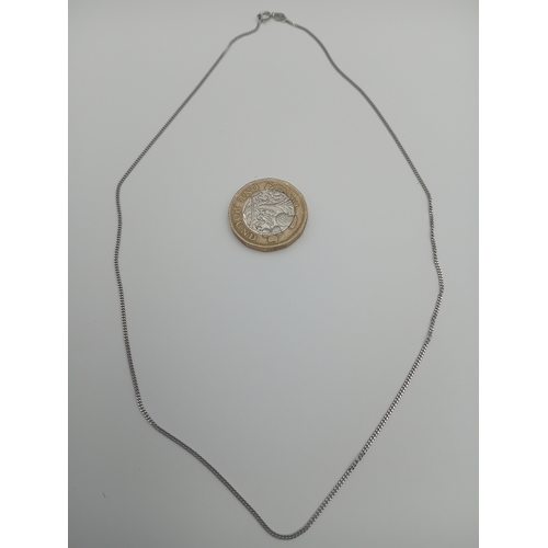 402 - A stamped 375 9ct white gold necklace. Weight 1.38 grams.