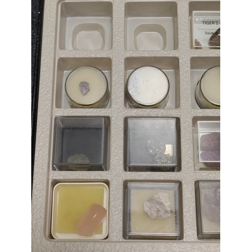 1 - A collection of minerals and semi-precious stones, to include; Tiger's eye, Ruby, Sapphire, Topaz, E... 