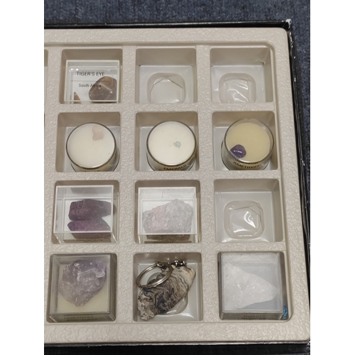 1 - A collection of minerals and semi-precious stones, to include; Tiger's eye, Ruby, Sapphire, Topaz, E... 