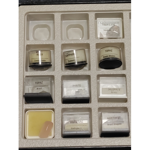 1 - A collection of minerals and semi-precious stones, to include; Tiger's eye, Ruby, Sapphire, Topaz, E... 