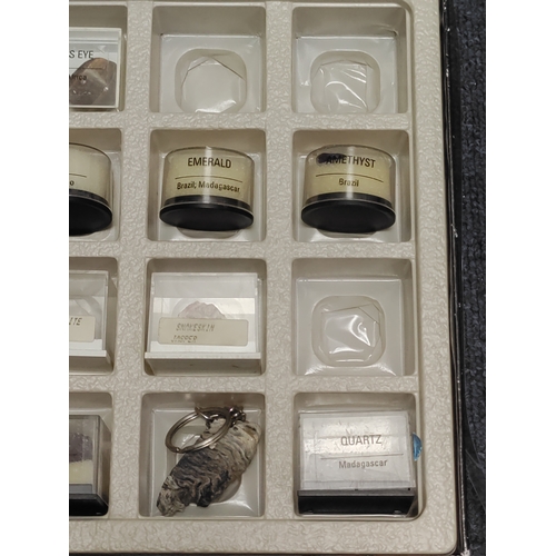 1 - A collection of minerals and semi-precious stones, to include; Tiger's eye, Ruby, Sapphire, Topaz, E... 