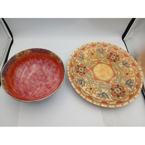 9 - A pair of ceramics influding an oriental style maling newcastle on tyne bowl and a floral crown duca... 