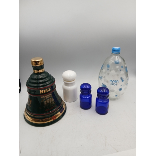 11 - A job lot collection of glass and ceramics featuring a christmas 1995 Bell's old scotch whisky wade ... 