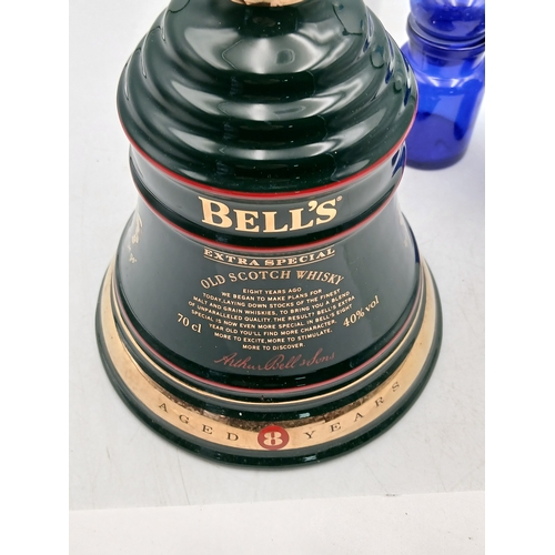 11 - A job lot collection of glass and ceramics featuring a christmas 1995 Bell's old scotch whisky wade ... 