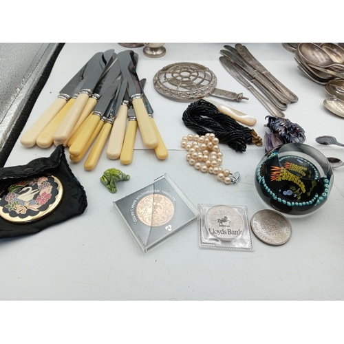 13 - A box of odds. To include Silver plate, glass paper weight, cutlery, Lorus men's wrist watch, etc...