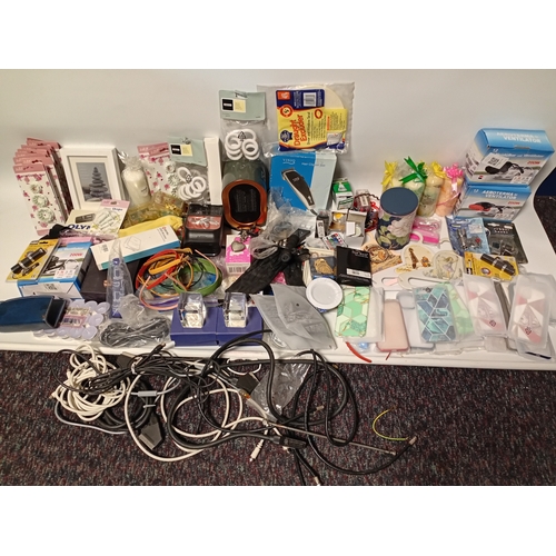 14 - A large job lot of car boot items. Featuring, phone cases, candles, torches, electrical items and mo... 