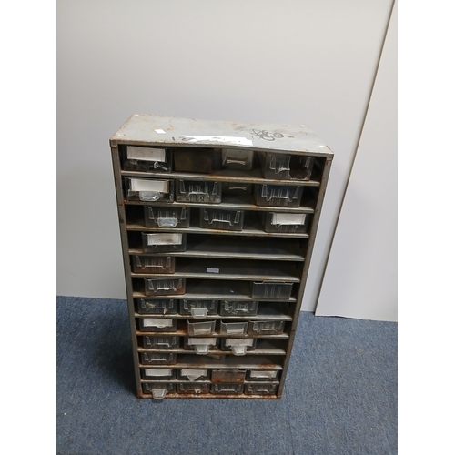 16 - A metal multi drawer cabinet with various vintage motorbike parts and tools. Measures Height 21 inch... 