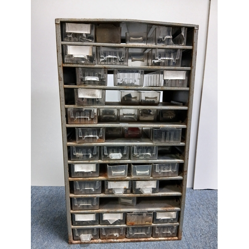 16 - A metal multi drawer cabinet with various vintage motorbike parts and tools. Measures Height 21 inch... 