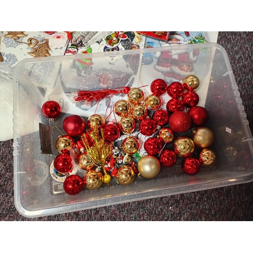 17 - A job lot of Christmas decorations. Featuring, lights, tree decorations, window stickers, an LED Wav... 
