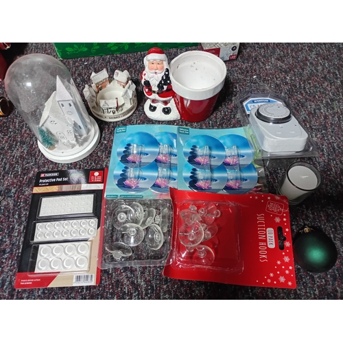 18 - A job lot of Christmas decorations. Featuring, lights, ornaments, a 24 hour timer switch, a candle, ... 