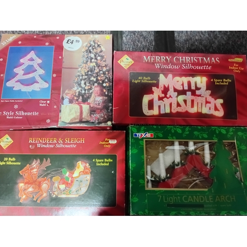 18 - A job lot of Christmas decorations. Featuring, lights, ornaments, a 24 hour timer switch, a candle, ... 