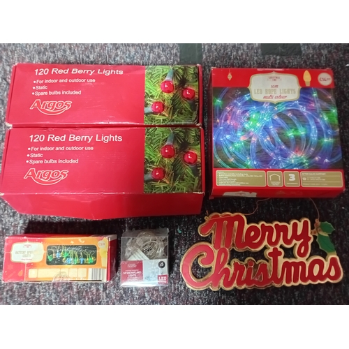 18 - A job lot of Christmas decorations. Featuring, lights, ornaments, a 24 hour timer switch, a candle, ... 