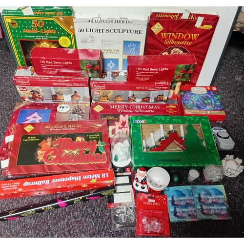 18 - A job lot of Christmas decorations. Featuring, lights, ornaments, a 24 hour timer switch, a candle, ... 