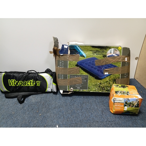 21 - A double airbed with a electric air pump and a vibrating belt made by Vibroaction. Pat tested and wo... 