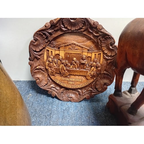 32 - A collection of decorative wooden items including carved figures of animals , people , dishes and a ... 