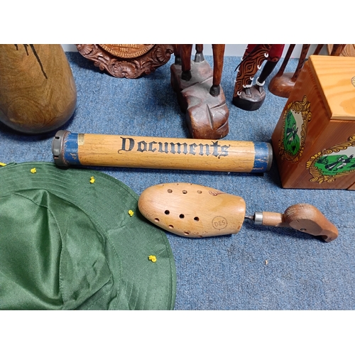 32 - A collection of decorative wooden items including carved figures of animals , people , dishes and a ... 