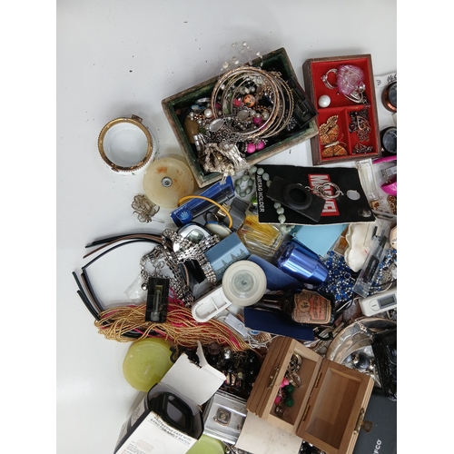 33 - A job lot to include jewellery, perfumes, phone accessories and much more.