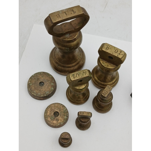 34 - A collection of weights from 1lb to 1/2 oz