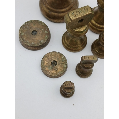 34 - A collection of weights from 1lb to 1/2 oz