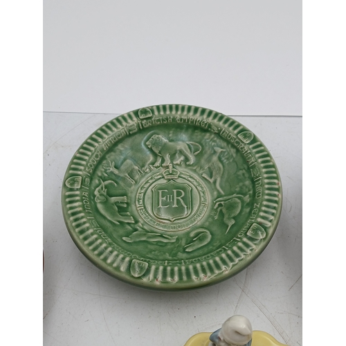 38 - A collection of ceramic Wade bowls or ash trays and trinket dishes featuring an england coronation 1... 