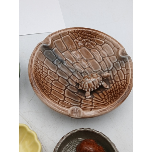 38 - A collection of ceramic Wade bowls or ash trays and trinket dishes featuring an england coronation 1... 