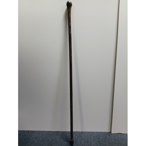 40 - A collection of walking sticks and umbrellas, with brands such as Dunlop, Lambert and Butler, Burtel... 