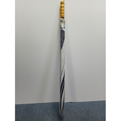 40 - A collection of walking sticks and umbrellas, with brands such as Dunlop, Lambert and Butler, Burtel... 