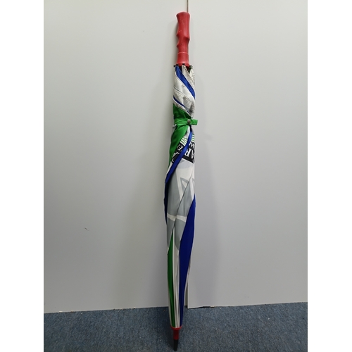 40 - A collection of walking sticks and umbrellas, with brands such as Dunlop, Lambert and Butler, Burtel... 