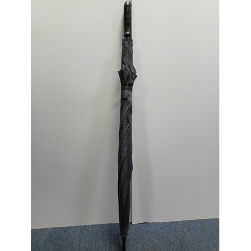 40 - A collection of walking sticks and umbrellas, with brands such as Dunlop, Lambert and Butler, Burtel... 