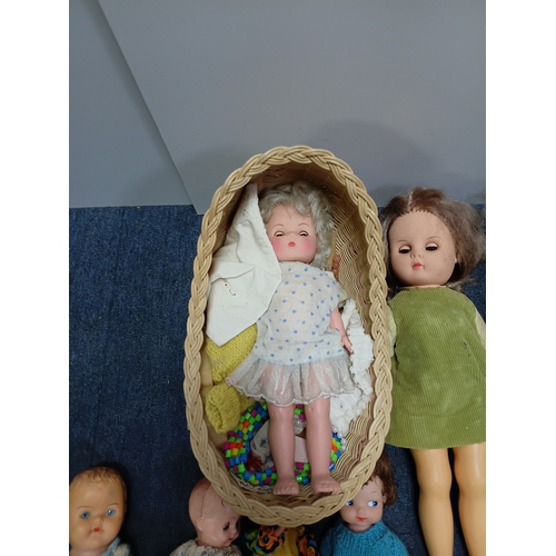 153 - A job lot of dolls and barbies with accessories such as clothes, shoes, hairclips and more.