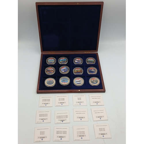 396 - A 2016 gold plated proof british military aircraft coin set with certificates of authenticity.