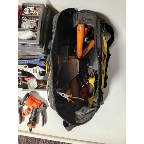 62 - A large set of hand tools organised into several cases and bags covering the needs of electrical ins... 