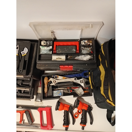 62 - A large set of hand tools organised into several cases and bags covering the needs of electrical ins... 