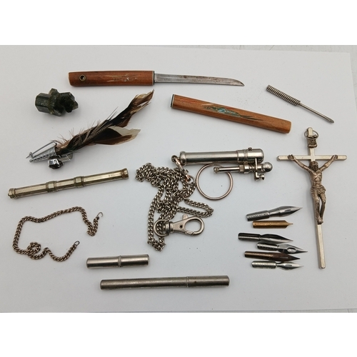 15 - A small collection to include a knife with a wooden sheath, a crucifix, a stone set feather brooch, ... 